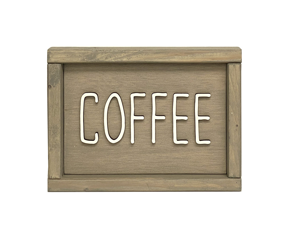 beige wood sign that says Coffee in white lettering