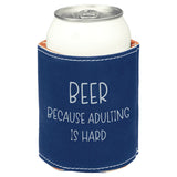 Blue can cooler with 'Beer because adulting is hard' text on a white background