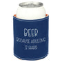 Blue can cooler with 'Beer because adulting is hard' text on a white background
