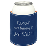 Navy blue can cooler with silver text on a white background