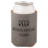 Gray can cooler with 'Beer because adulting is hard' text on a white background