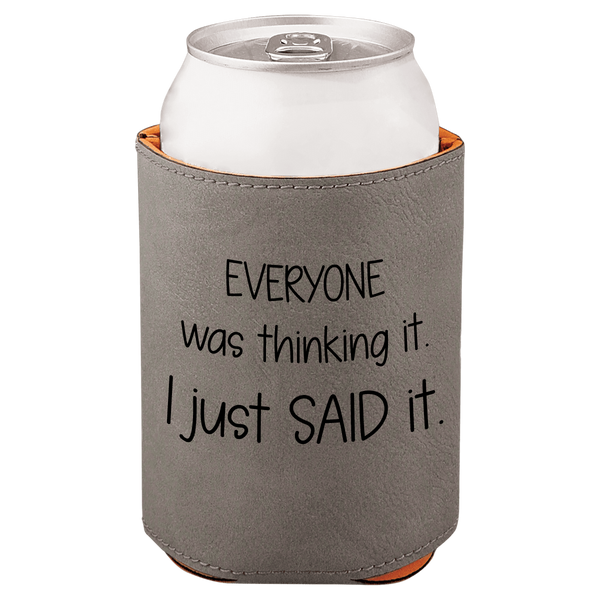 Gray can cooler with humorous text and white can inside on a white background