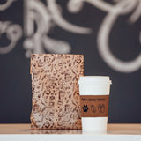 I'm a simple woman coffee cup sleeve paw football flip-flops with a coffee shop bag