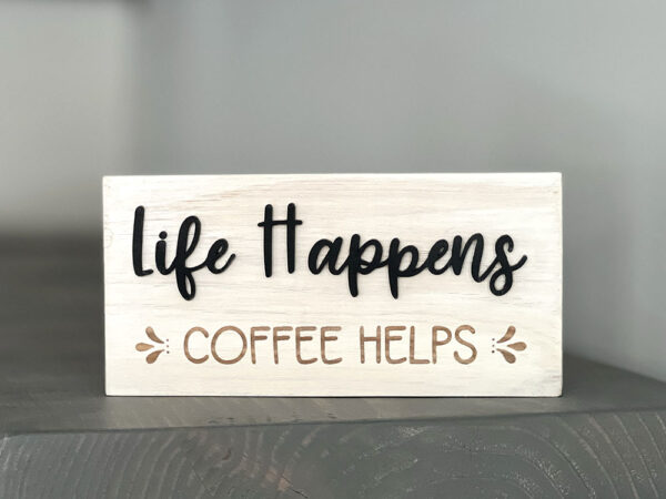 life happens coffee helps wood sign on gray shelf