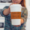 Orange cork fabric cup sleeve I'm a simple woman mug football flip flops in a coffee shop