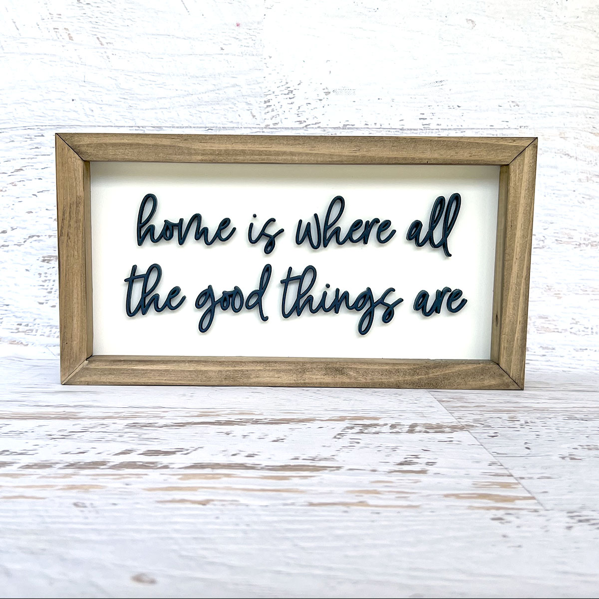 Home is where all the good things are thin script wood sign