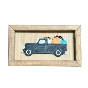 Pickup truck with pumpkins framed sign